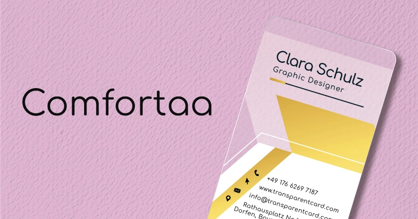 A business card featuring the Comfortaa font, with a modern pink and yellow design